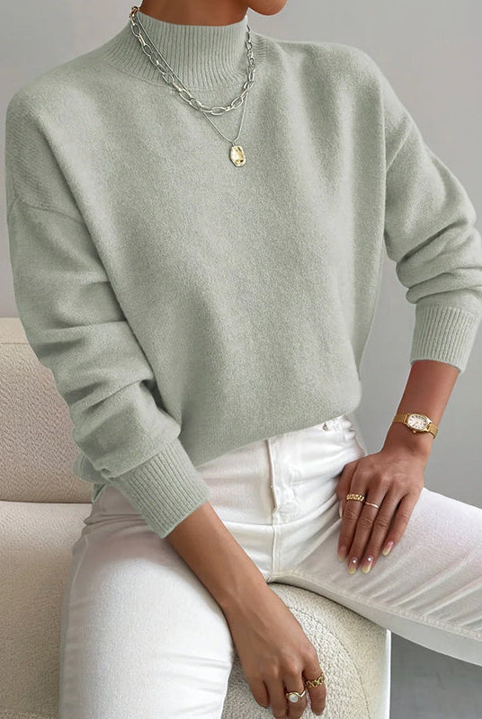 Lumina Wear Valentina relaxed mock neck knit sweater with ribbed cuffs, soft and cozy for casual wear.