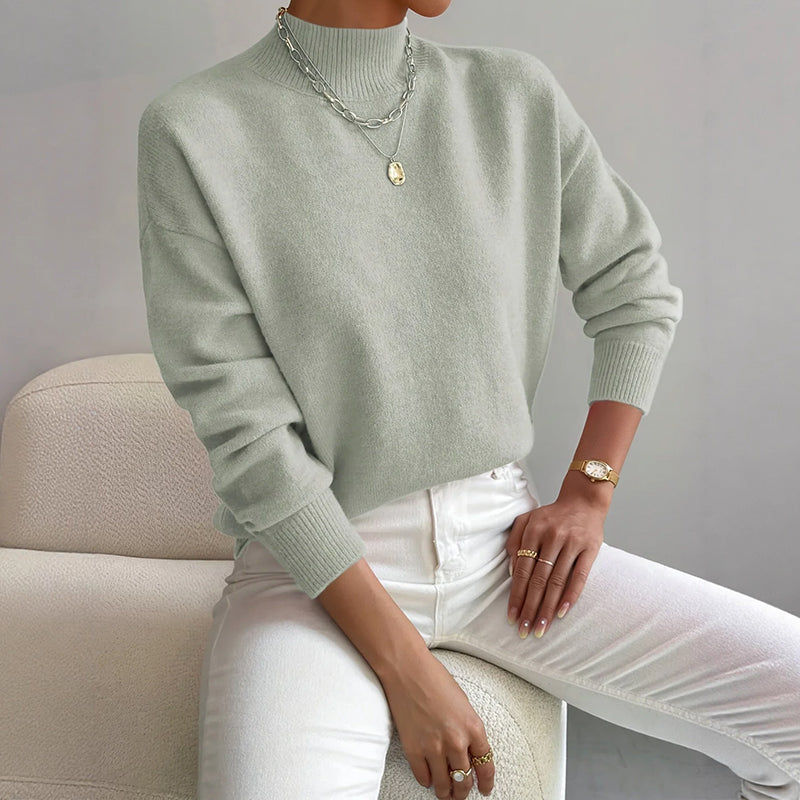 Lumina Wear Valentina relaxed mock neck knit sweater with ribbed cuffs, soft and cozy for casual wear.