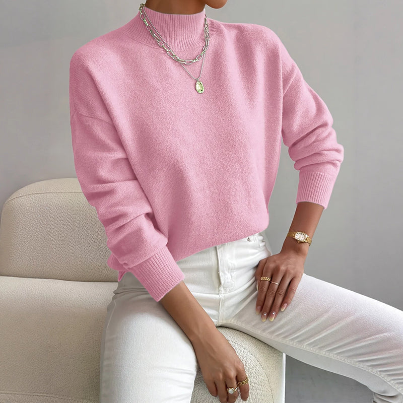 Lumina Wear Valentina relaxed mock neck knit sweater with ribbed cuffs, featuring a cozy, casual fit in soft knit fabric.