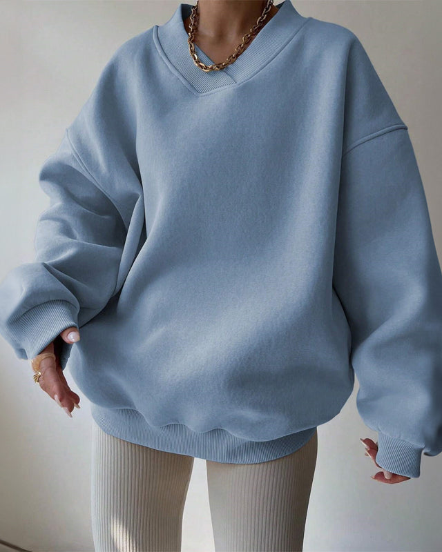 Lumina Wear Valentina pastel oversized sweater with relaxed fit and V-neckline, soft knit fabric, and long sleeves.