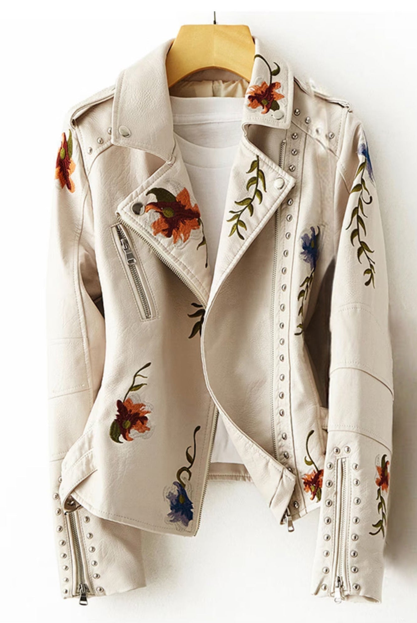 Valentina retro floral embroidered vegan leather jacket with stud accents by Lumina Wear, featuring colorful floral embroidery and stud details.