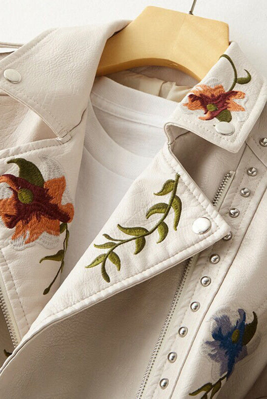 Valentina retro floral embroidered vegan leather jacket with stud accents by Lumina Wear, shown from the front with floral embroidery details.