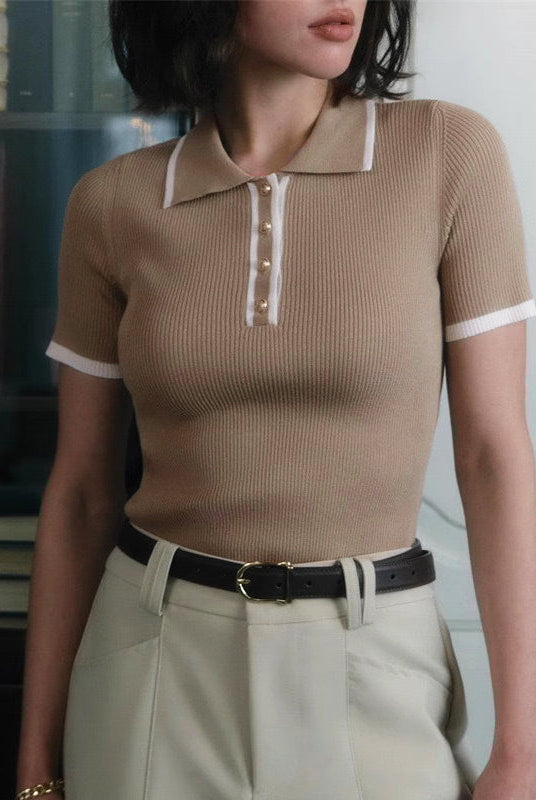 Valentina Lumina Wear structured ribbed knit top with contrast lapel, featuring a fitted silhouette and stylish design.