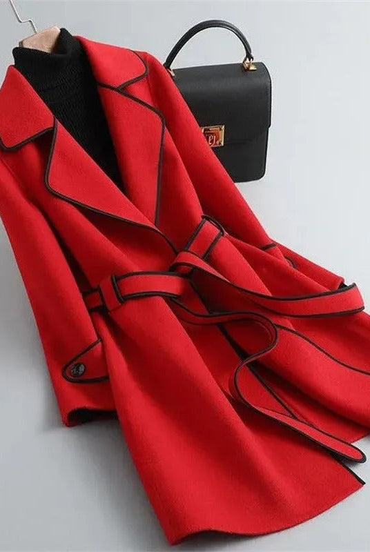 Black trench coat with contrast piping, elegant design by Lumina Wear, featuring tailored fit and classic style.