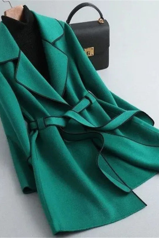 Black Verona trench coat with contrast piping by Lumina Wear, stylish and elegant with a tailored fit and classic design.