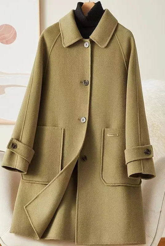 Lumina Wear Victoria classic warm winter coat with front pockets, featuring a stylish and cozy design for cold weather.