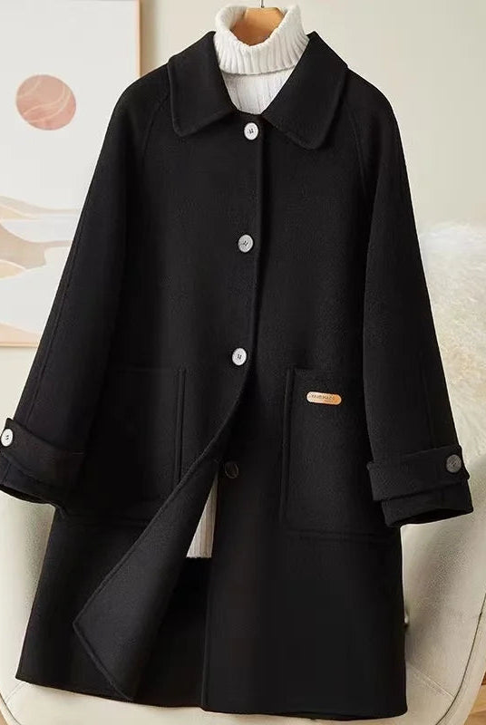 Lumina Wear Victoria warm winter coat with front pockets, stylish and cozy for cold weather, in a classic design.