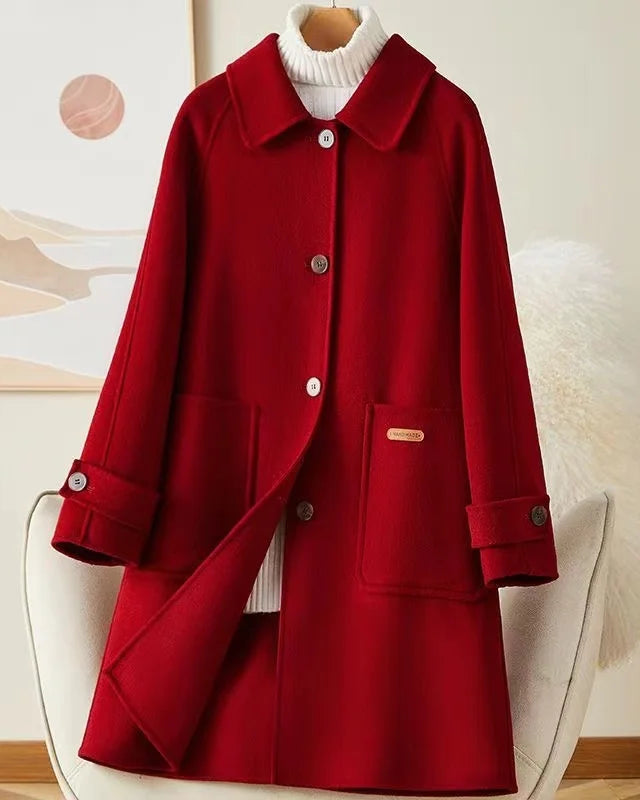 Lumina Wear Victoria winter coat with a warm, classic design, front pockets, and a stylish silhouette for cold weather.