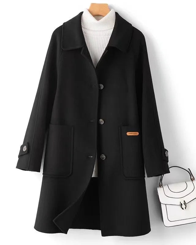 Lumina Wear Victoria warm winter coat with front pockets, stylish classic design, insulated for cold weather, in a cozy outerwear style.