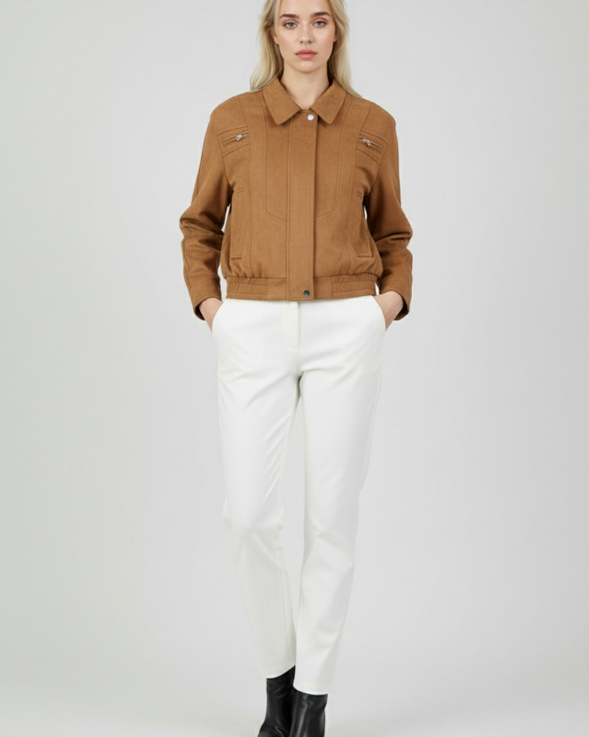Elegant brown bomber jacket from Lumina Wear featuring a versatile design, shown on a model with stylish accessories.