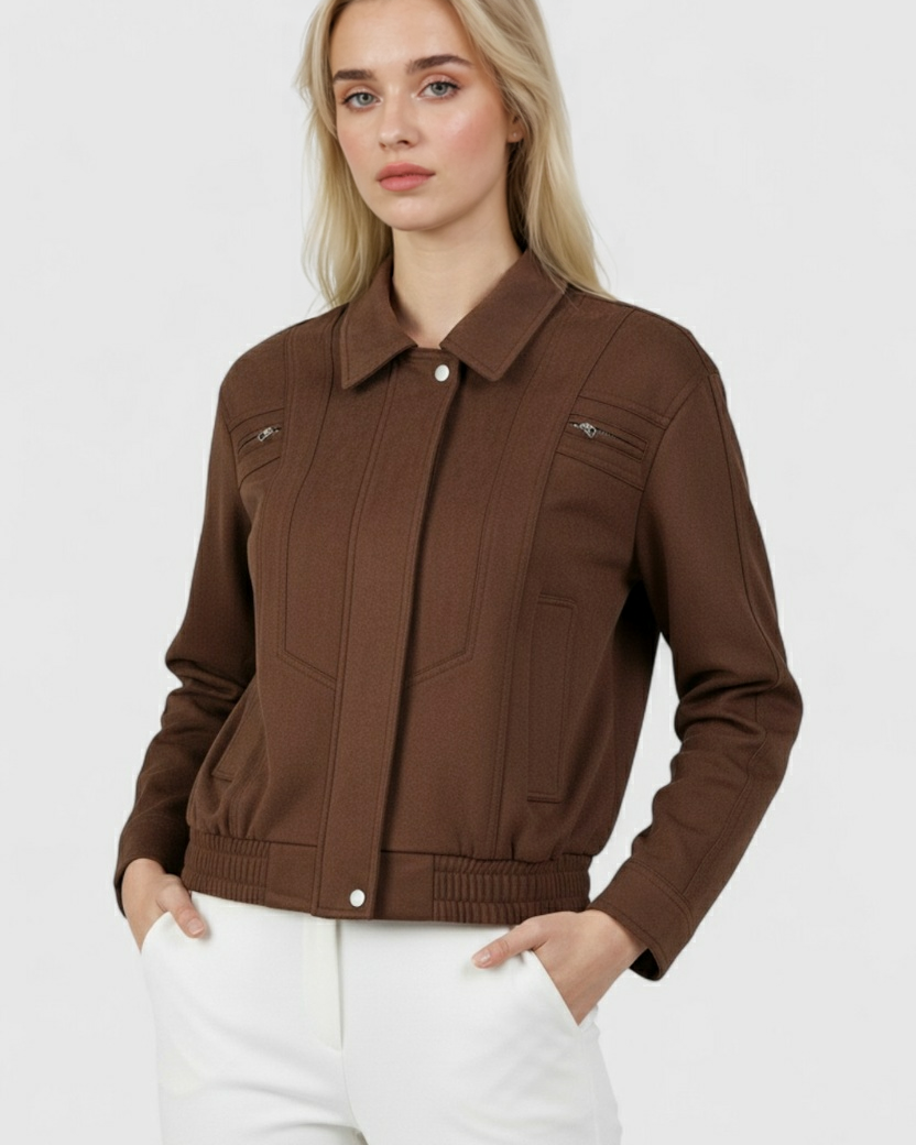 Dark brown bomber jacket by Lumina Wear featuring a stylish, versatile design and elegant fit in a close-up view.