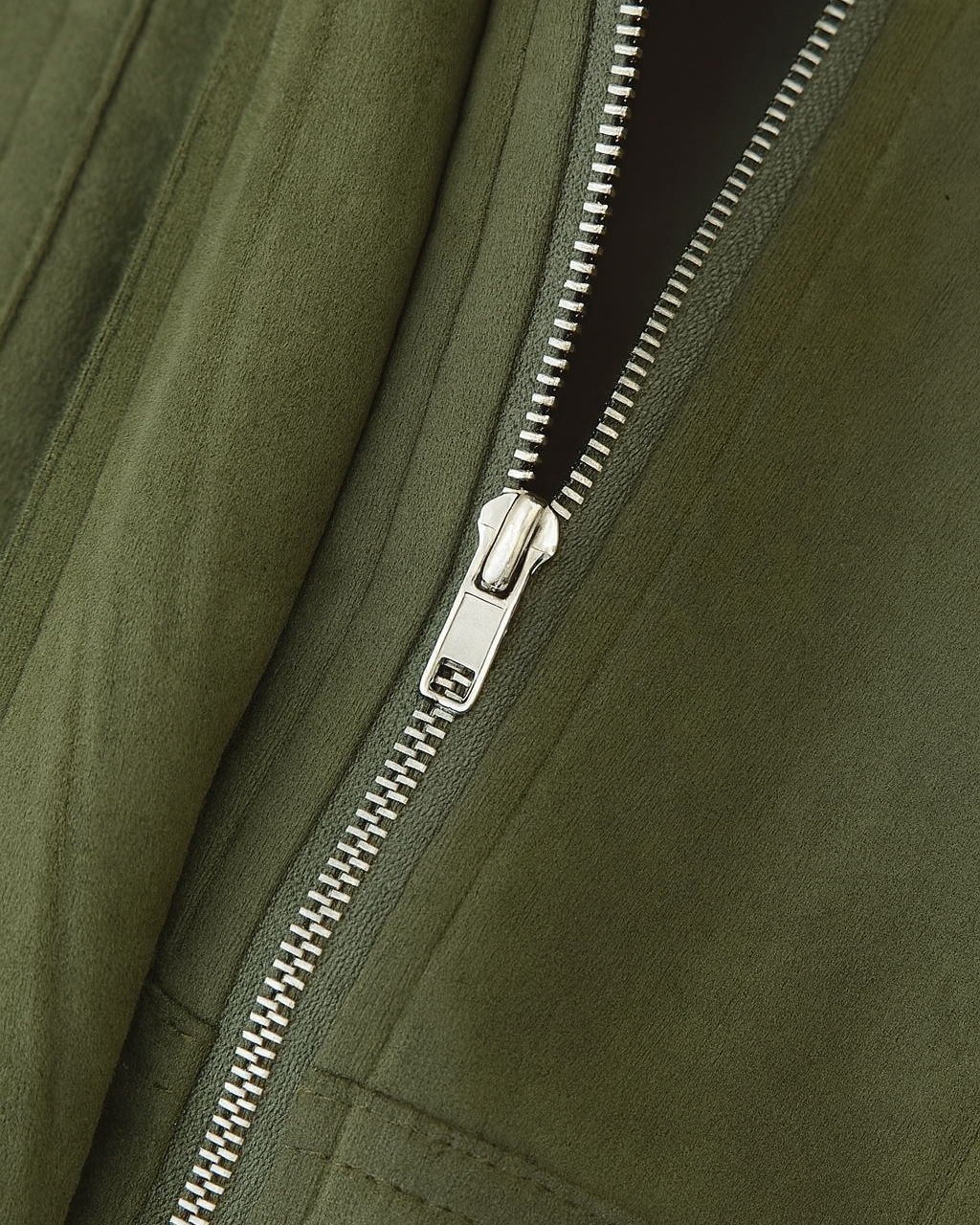 Elegant green Victoria bomber jacket by Lumina Wear, featuring a timeless style and classic fit, shown on a model.