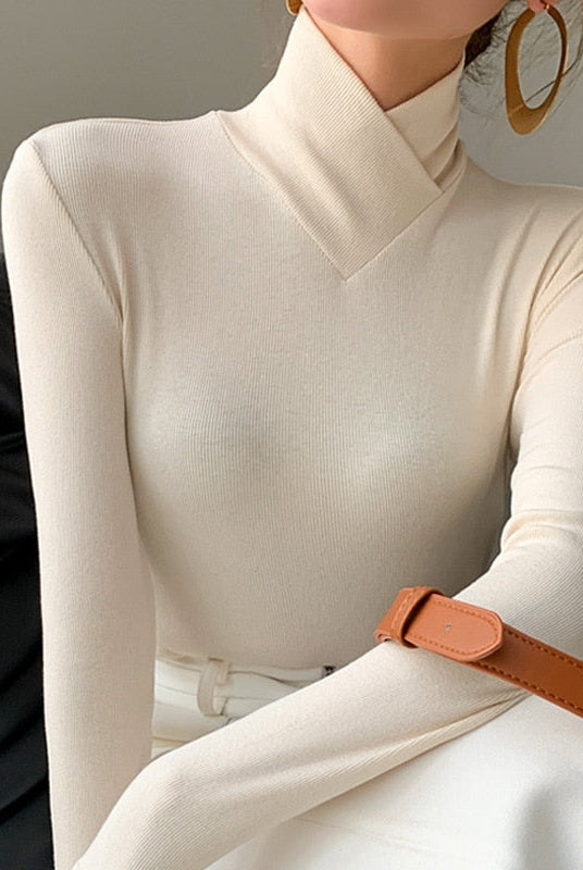 Lumina Wear Victoria women's mock neck top with a streamlined fit, elegant design, and smooth fabric, suitable for sophisticated casual wear.