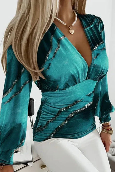 Luxurious Lumina Wear Victoria elegant V-neck blouse with refined detailing, featuring soft fabric and stylish design.