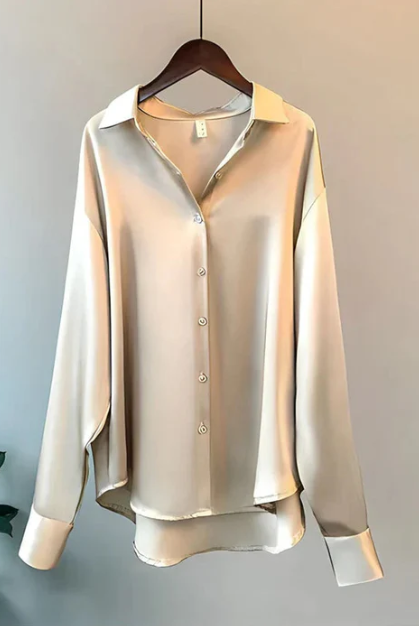 White button-down blouse with relaxed fit from Lumina Wear, featuring a classic collar and stylish, elegant design.