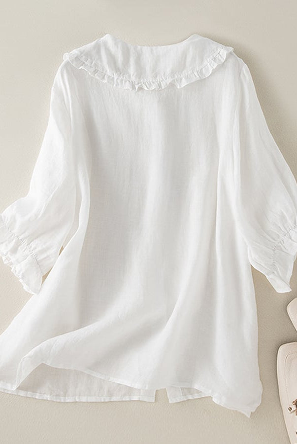 Light blue Lumina Wear Victoria relaxed fit ruffle collar women's top with short sleeves, perfect for effortless summer style.