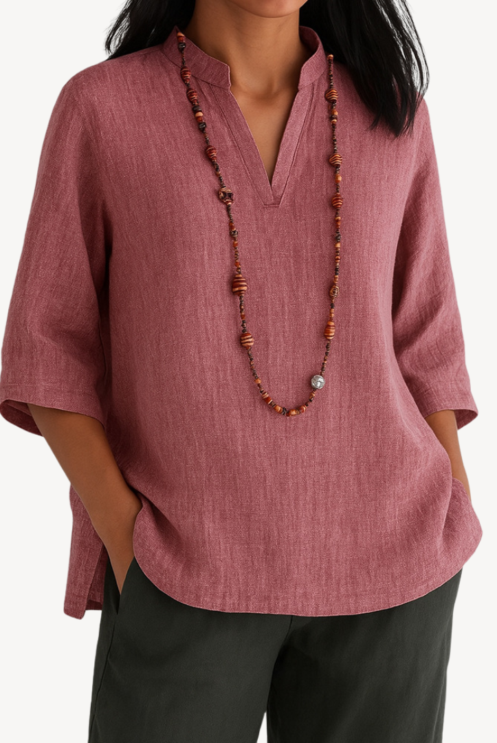 Light beige Victoria linen tunic top by Lumina Wear featuring a relaxed fit and minimalist design, displayed on a neutral background.