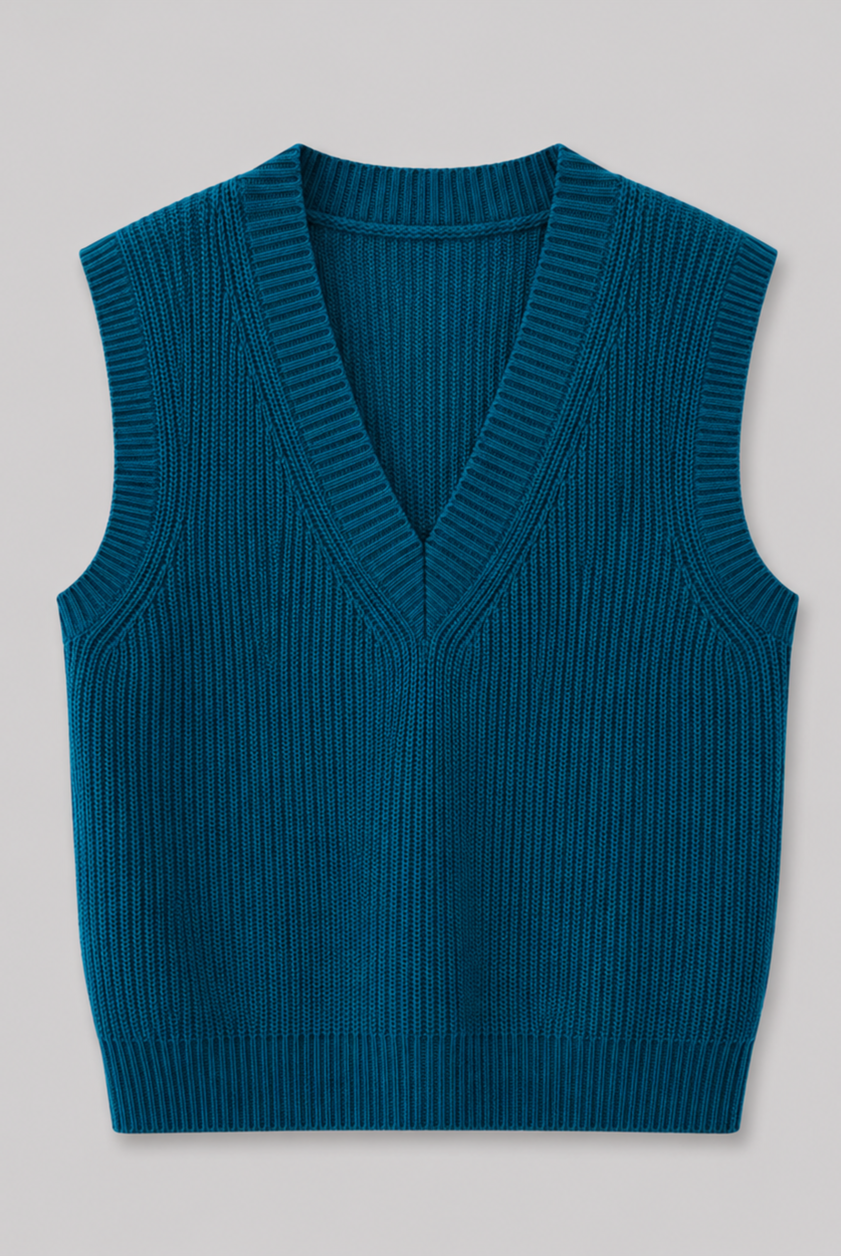 Lightweight V-neck sweater vest with ribbed trims from Lumina Wear, worn over a shirt, showcasing a stylish, casual look.