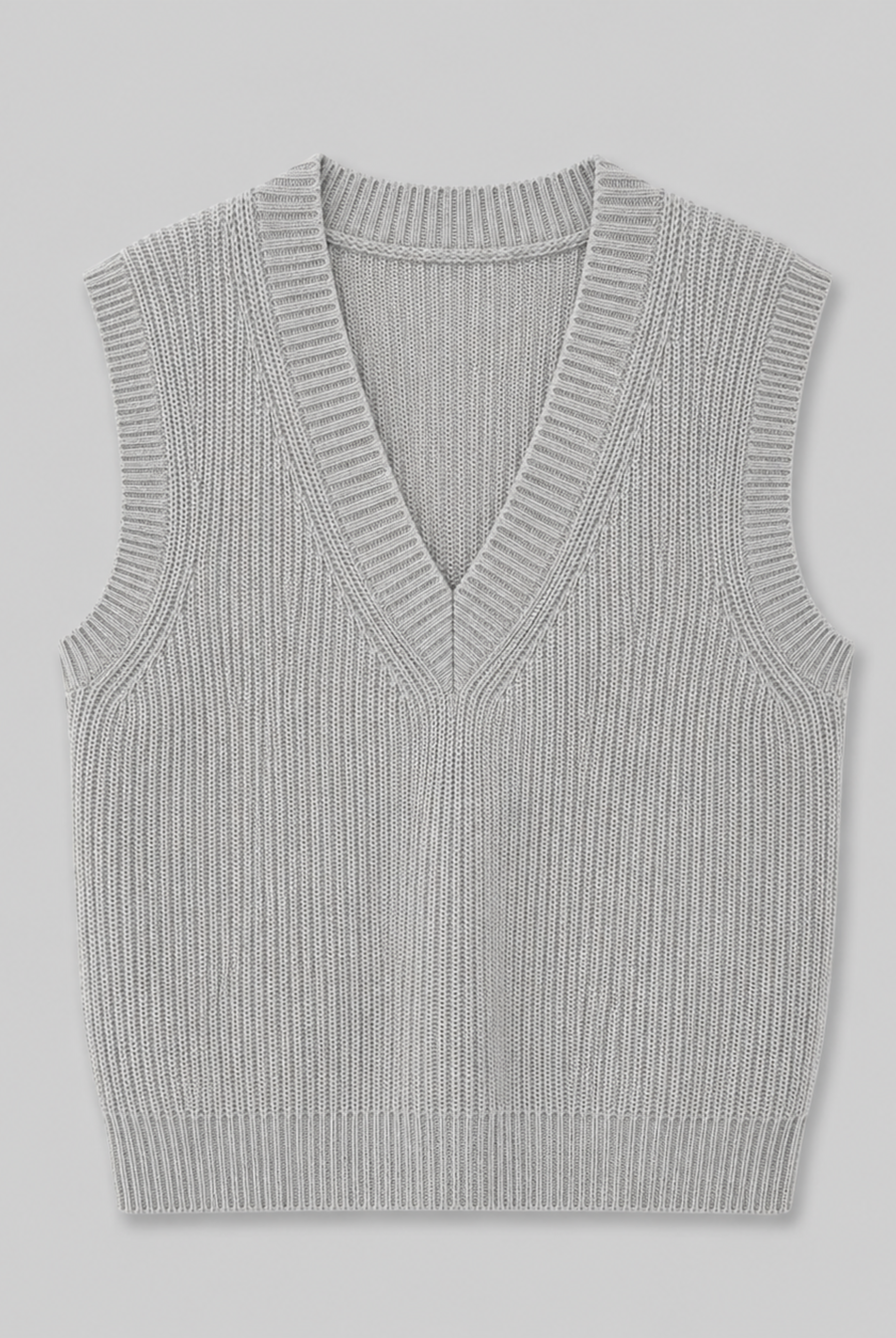 Lightweight V-neck sweater vest with ribbed trims from Lumina Wear, shown in a soft, neutral color on a model.