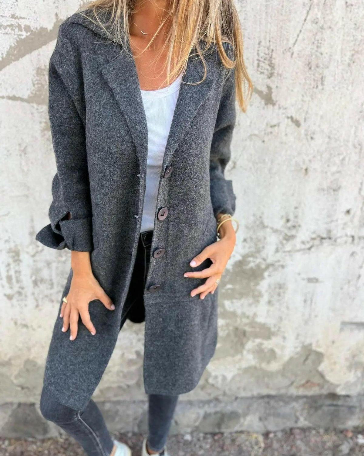 Green Lumina Wear Ada long knit coat showing its cozy, stylish design with a tailored fit and textured knit fabric.