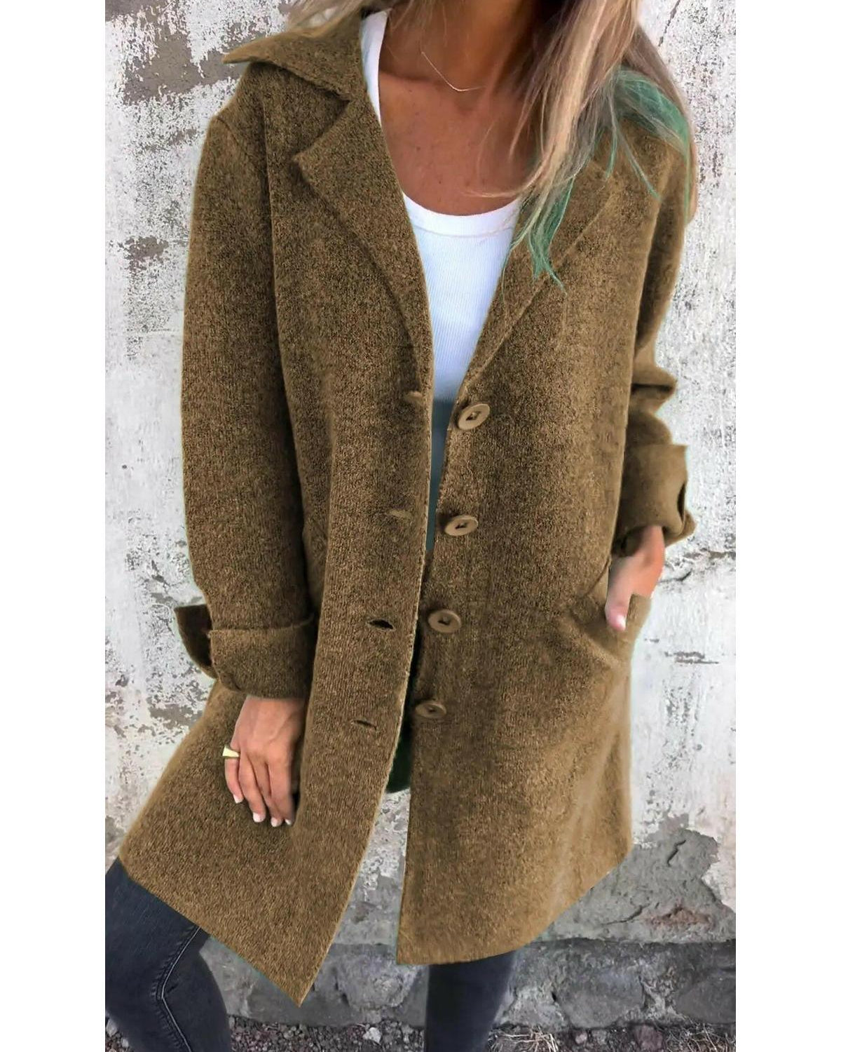 Green Lumina Wear Ada long knit coat with stylish, cozy design, showcased on a model in a fashion setting.