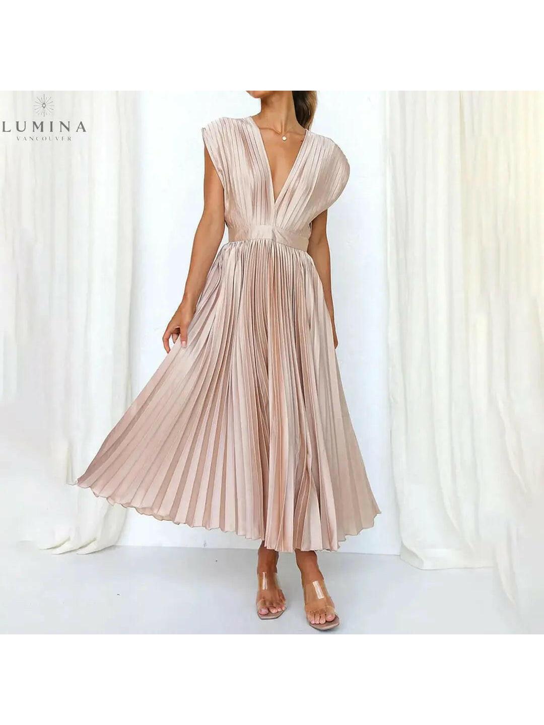 Alexia elegant champagne wedding guest dress by Lumina Vancouver, sleeveless with a flattering fit for special occasions.