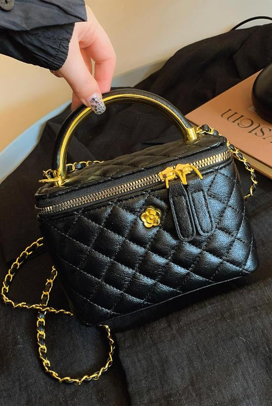 White quilted crossbody handbag by Lumina Wear featuring an adjustable strap and stylish design.