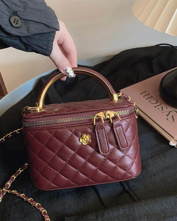 White Lumina Wear Alice quilted crossbody handbag with adjustable strap, stylish and compact for everyday use.