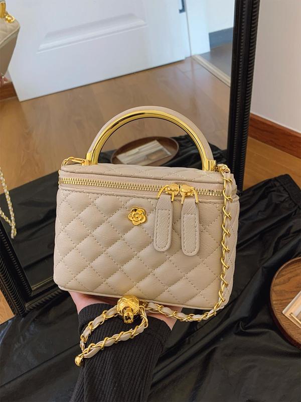 White Lumina Wear Alice quilted crossbody handbag with adjustable strap, featuring a stylish design and compact size.