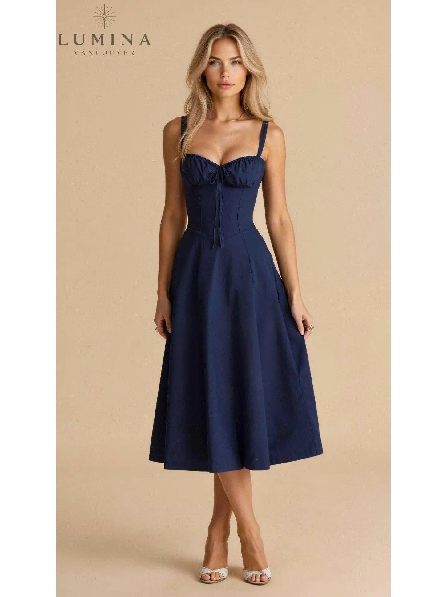 Yellow Alina waist dress by Lumina Vancouver, elegant and flattering for wedding guests, with chic, fitted design.