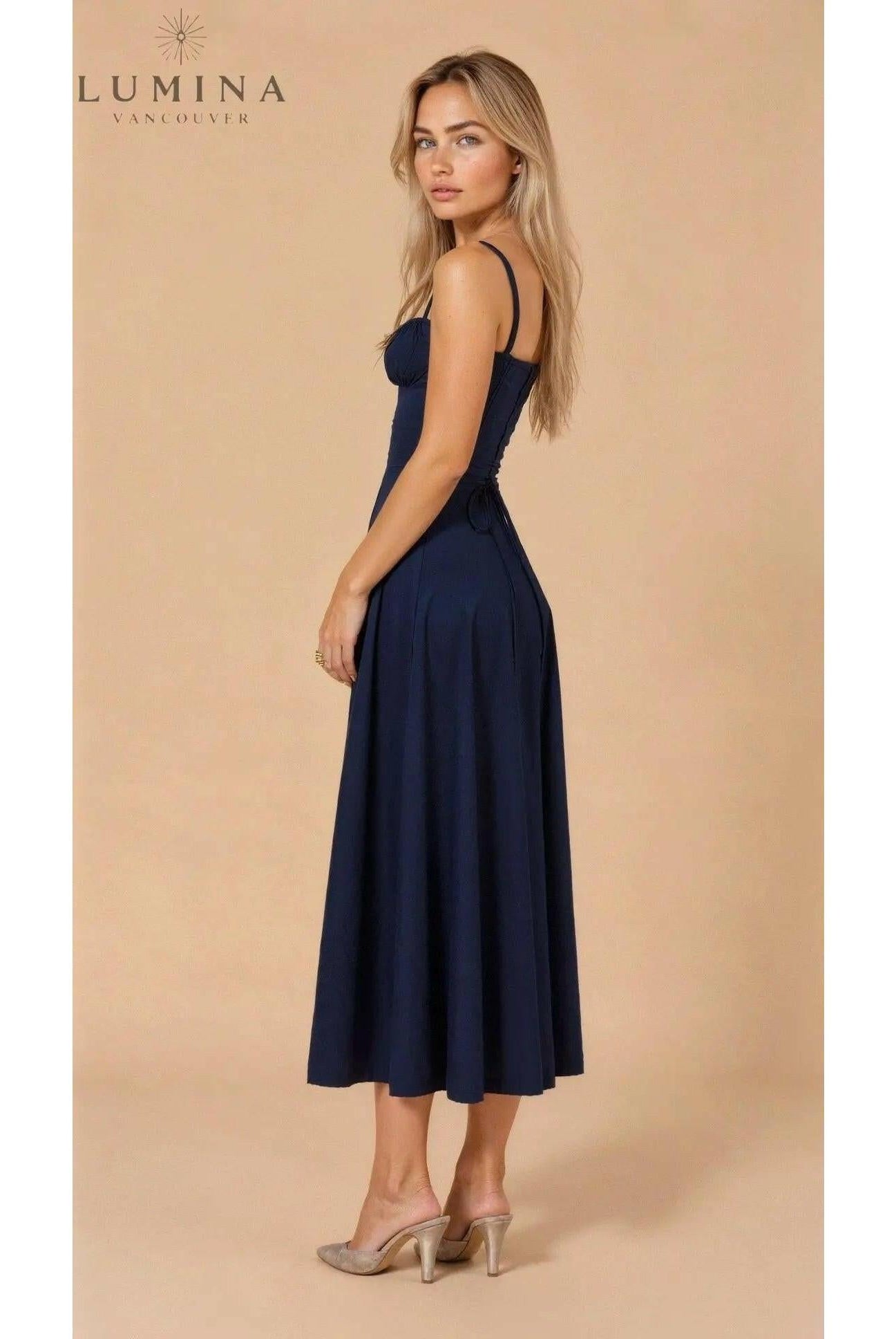 Yellow Lumina Wear Alina evening dress featuring a flattering waist design, perfect for chic wedding guest attire.