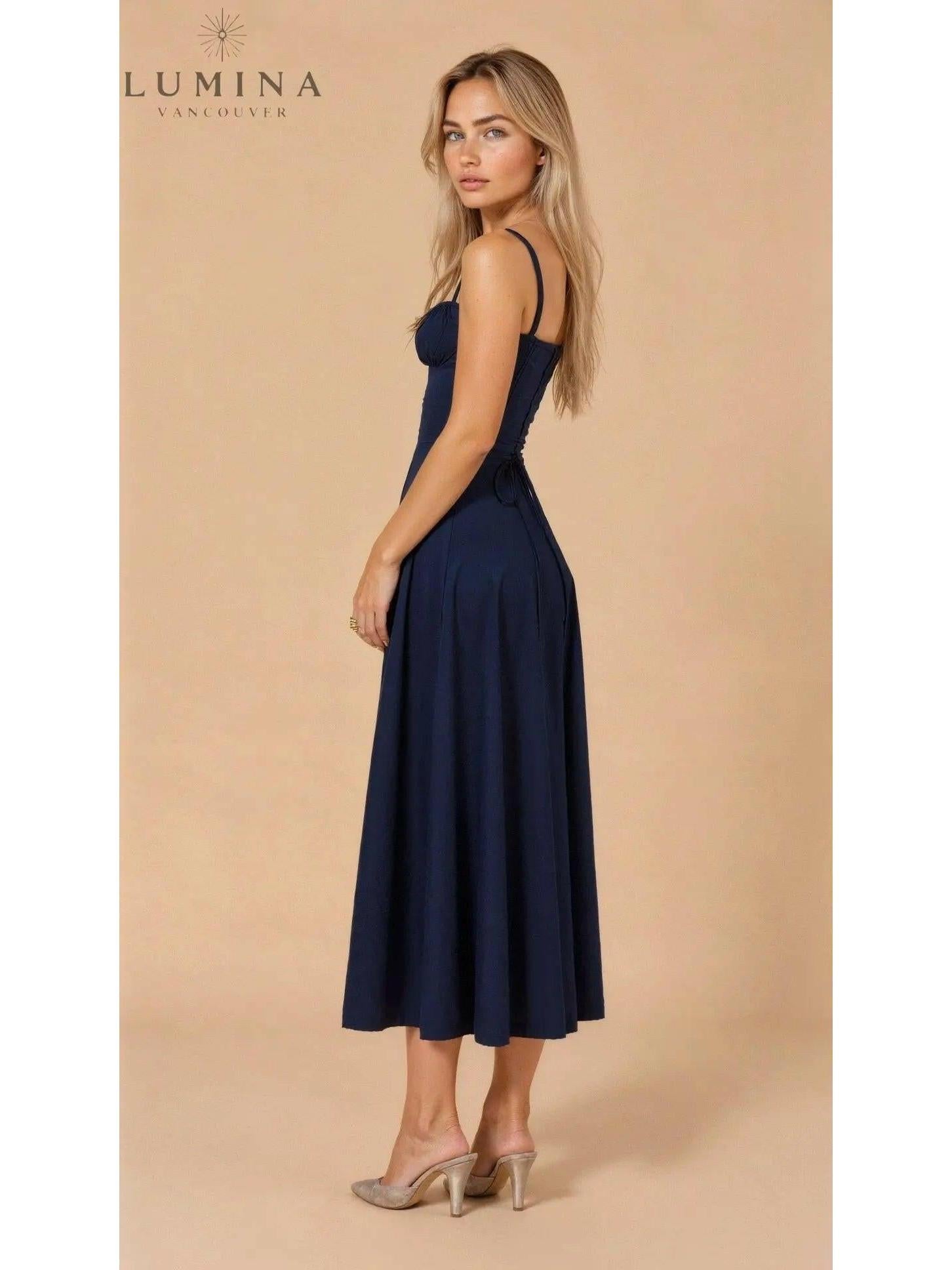Yellow Alina waist dress by Lumina Vancouver, elegant and chic wedding guest dress with a flattering fit.
