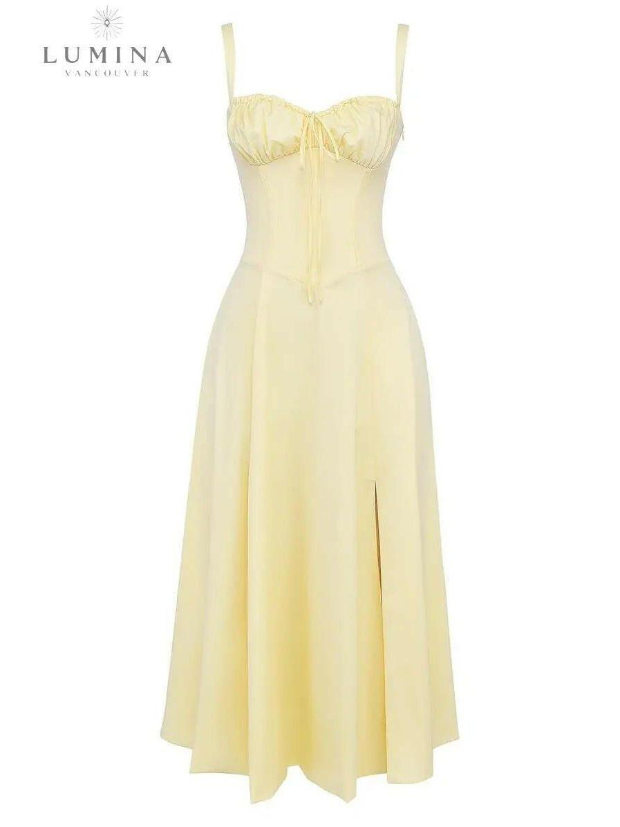 Yellow Alina waist dress by Lumina Vancouver, elegant and chic wedding guest dress with a flattering fit.