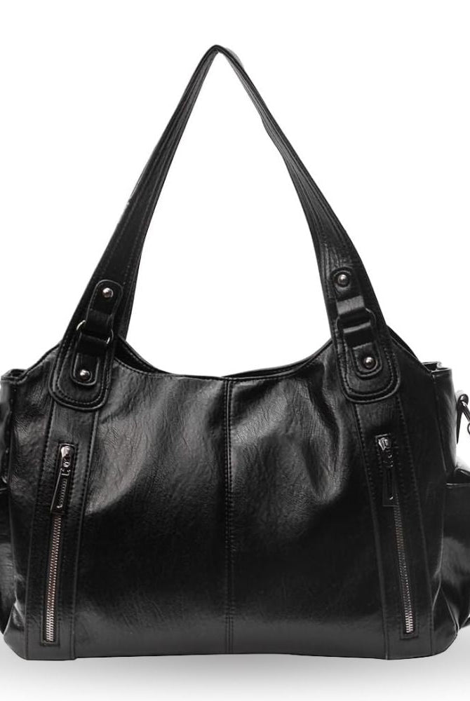 Black Lumina Wear Aliona backpack with versatile design, featuring multiple compartments and stylish black fabric for school or daily use.
