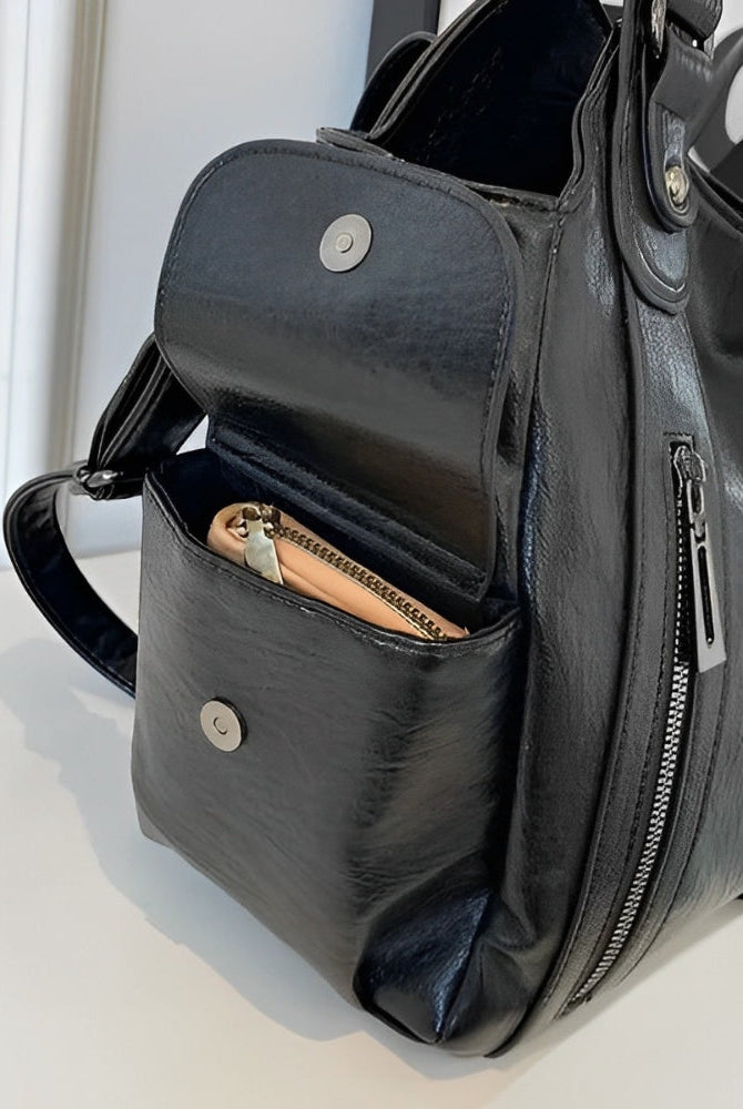Aliona black school backpack by Lumina Wear, featuring versatile compartments and stylish design for students.