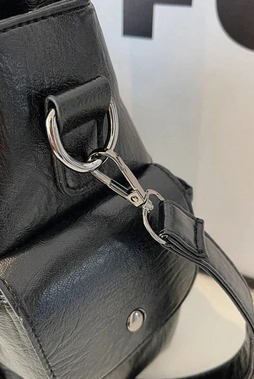 Black Lumina Wear Aliona backpack with multiple compartments and adjustable straps, designed for stylish school use.