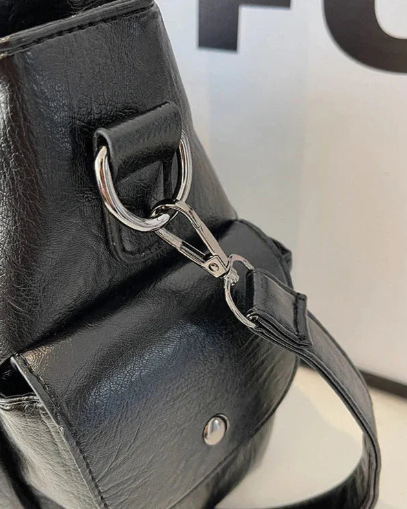Lumina Wear Aliona black backpack featuring versatile pockets and stylish design, ideal for school and daily use.
