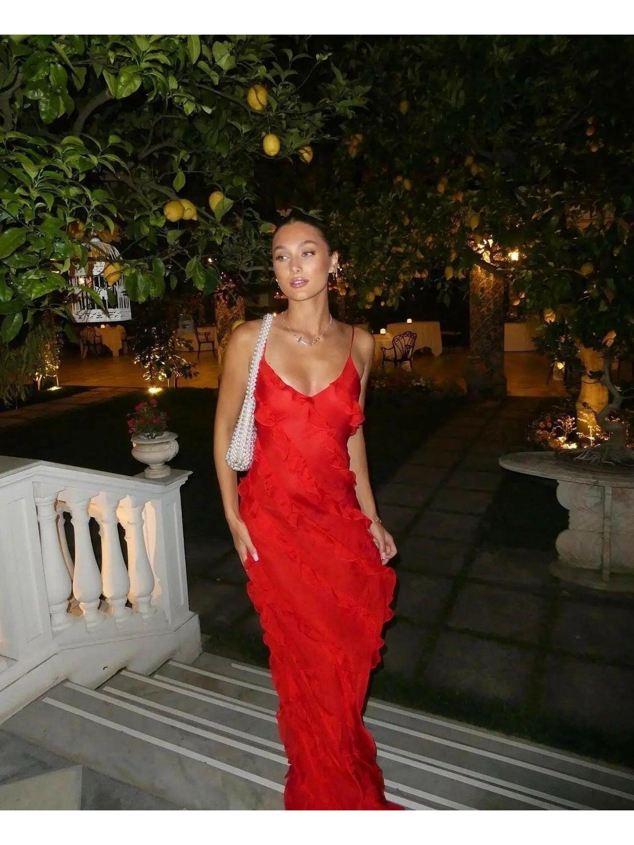 Red Aliza ruffled maxi dress by Lumina Vancouver, perfect for wedding guests, shown on a size 8-10 model.