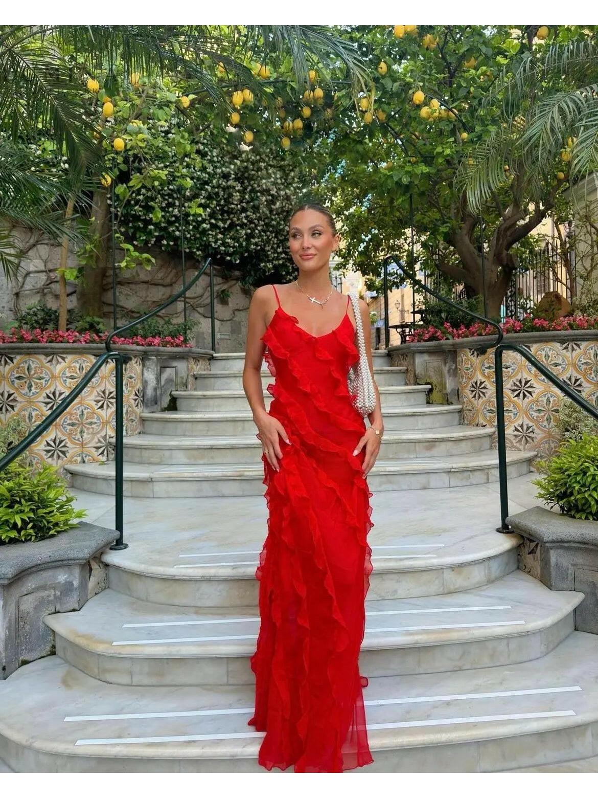 Red Aliza ruffled maxi dress by Lumina Vancouver, perfect for wedding guests, shown on a size 8-10 model.