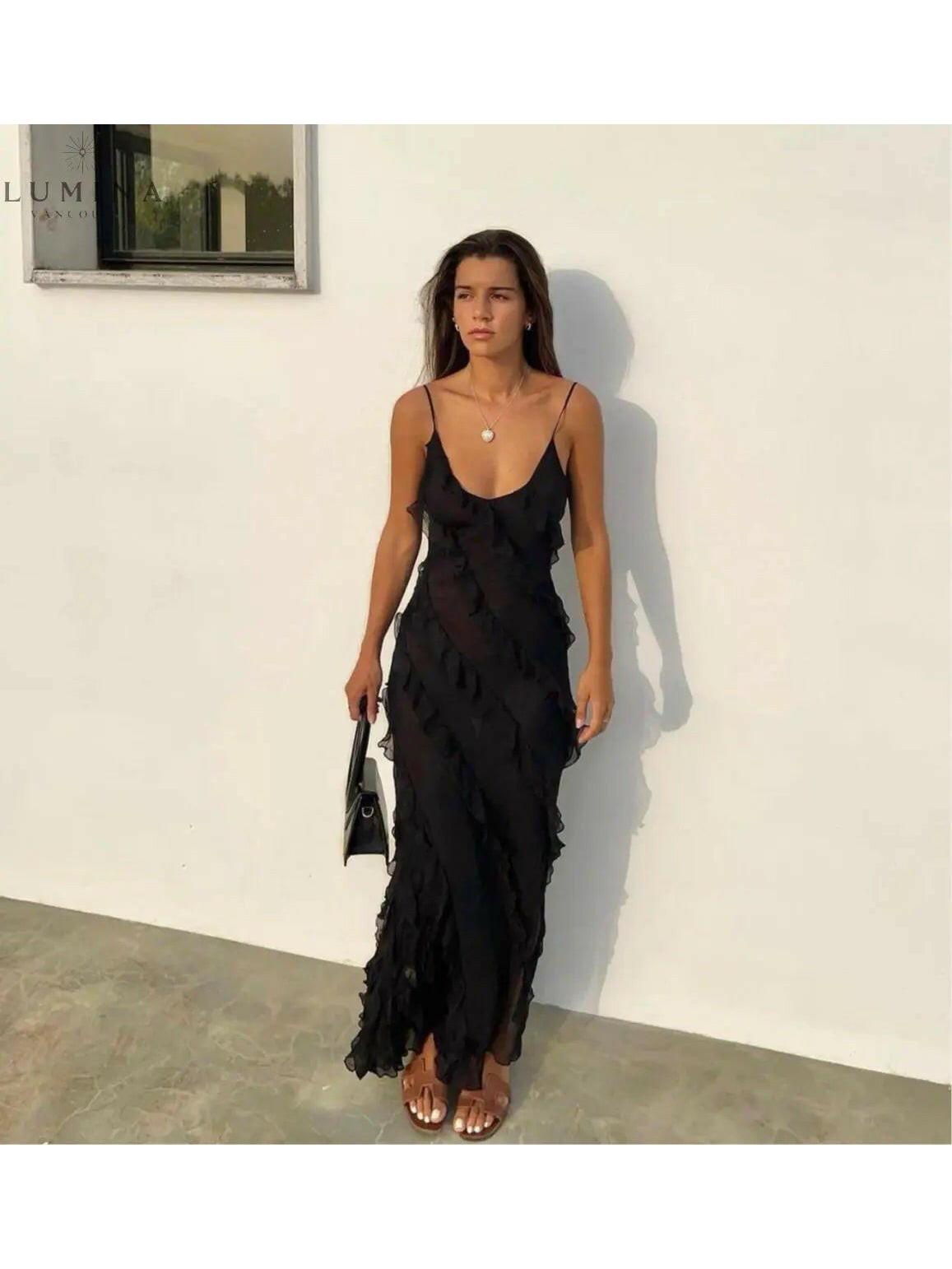 Red Aliza ruffled maxi dress for wedding guests by Lumina Vancouver, featuring elegant ruffle details and flowing silhouette.