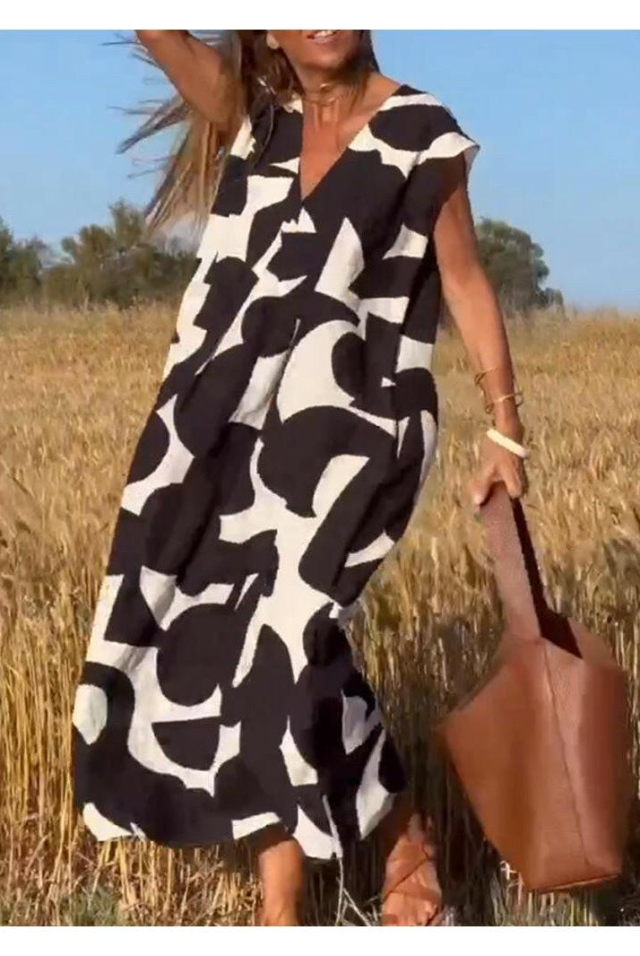 Black Alvina™ Relaxed Abstract Dress by Lumina Vancouver, featuring a flowy silhouette and artistic pattern.