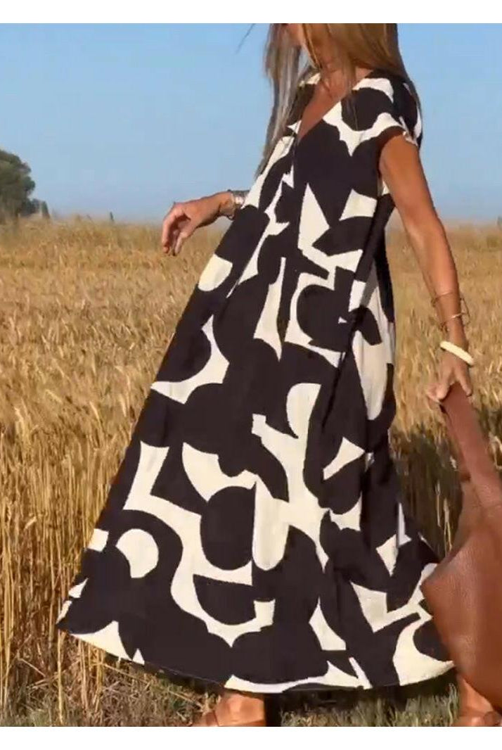 Black Alvina™ relaxed abstract dress by Lumina Vancouver, casual fit with artistic print, perfect for stylish everyday wear.