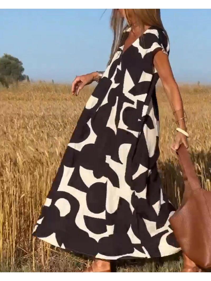 Black Alvina™ relaxed abstract dress by Lumina Vancouver, casual fit with artistic print, perfect for stylish everyday wear.