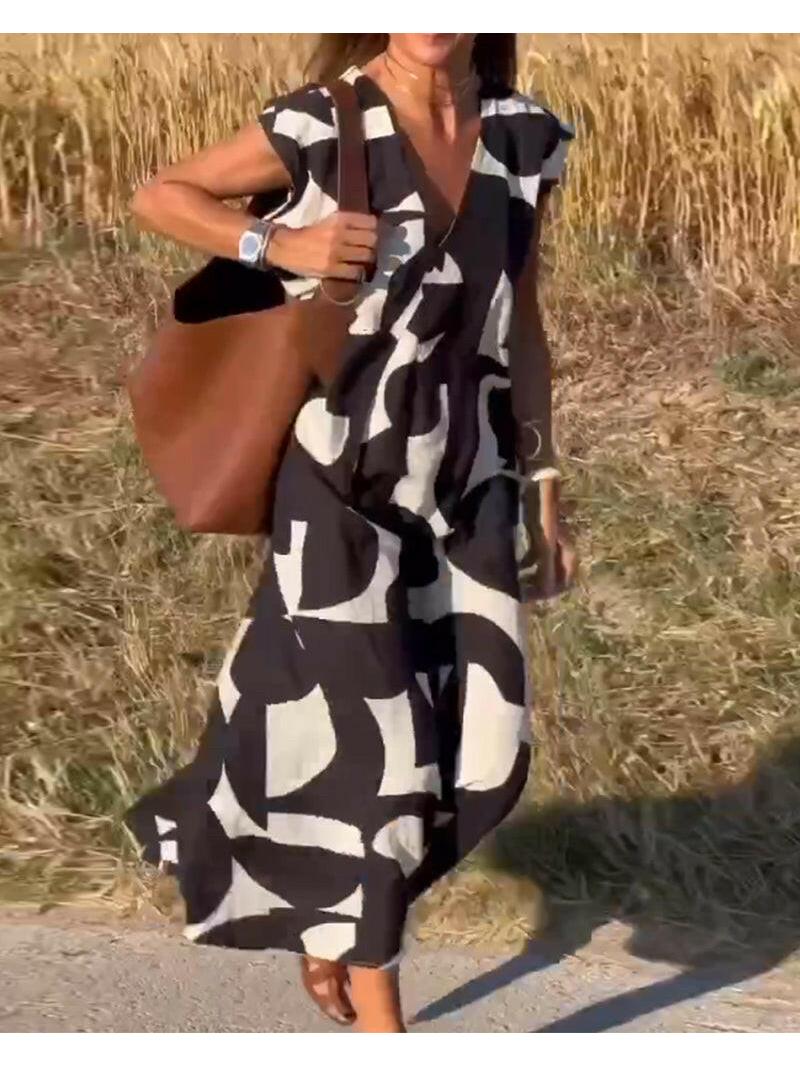 Black Alvina™ Relaxed Abstract Dress by Lumina Vancouver, featuring a flowing design and artistic pattern, perfect for casual wear.