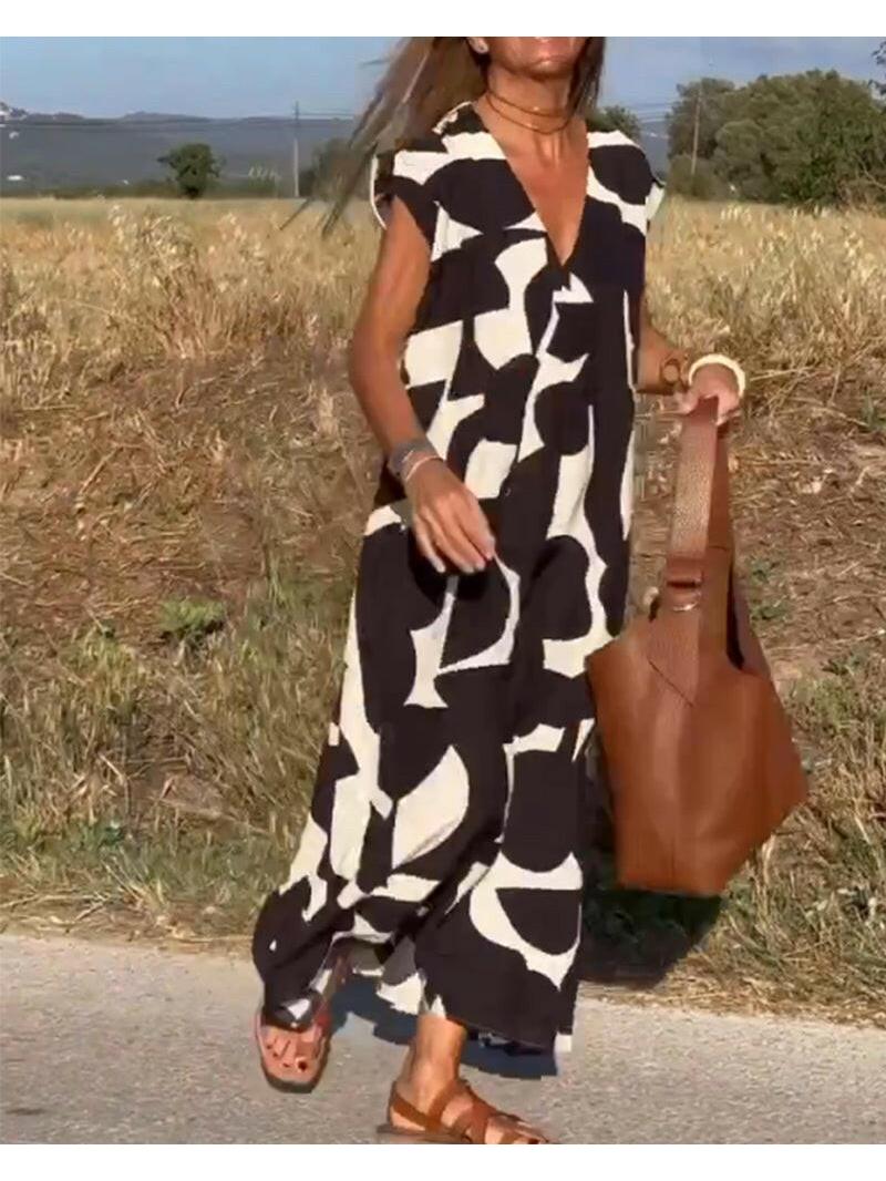 Black Alvina™ Relaxed Abstract Dress by Lumina Vancouver, featuring a flowy silhouette and artistic print.