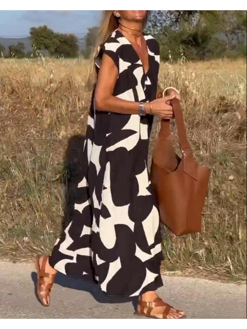Black Alvina™ Relaxed Abstract Dress by Lumina Vancouver, featuring a flowing silhouette and artistic print.