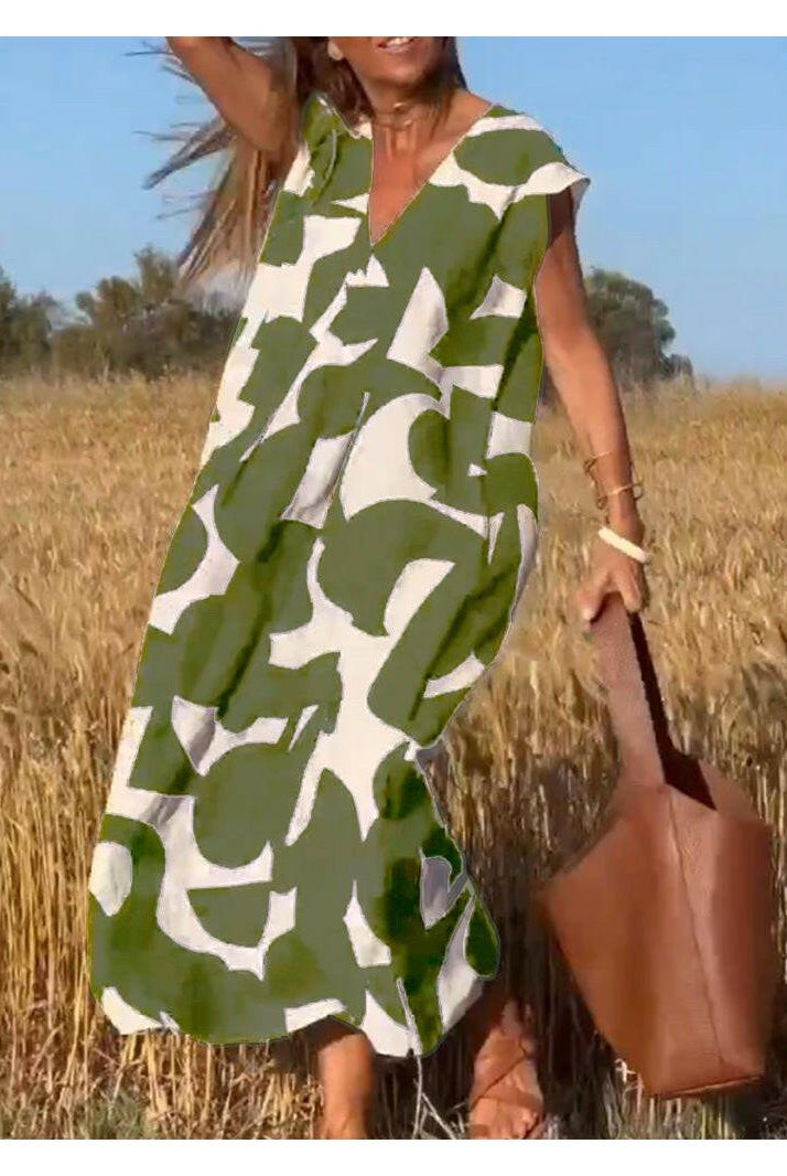 Black Alvina™ Relaxed Abstract Dress by Lumina Vancouver, featuring a flowing design and artistic print.