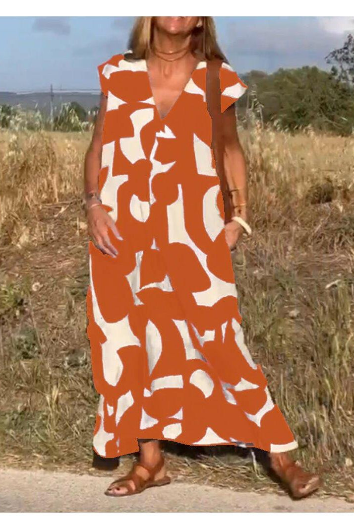 Black Alvina™ Relaxed Abstract Dress by Lumina Vancouver, showcasing a stylish, flowy silhouette and modern abstract pattern.