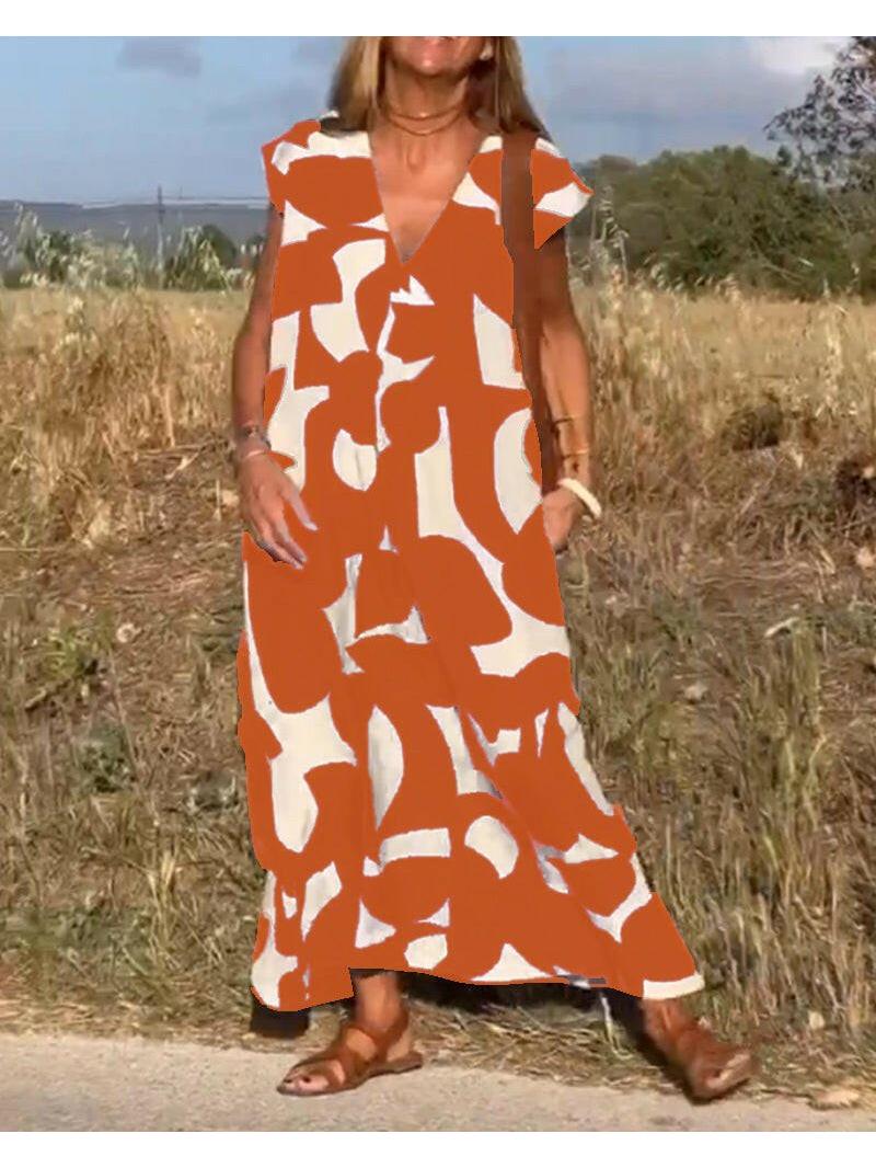 Black Alvina™ Relaxed Abstract Dress by Lumina Vancouver, showcasing a stylish, flowy silhouette and modern abstract pattern.