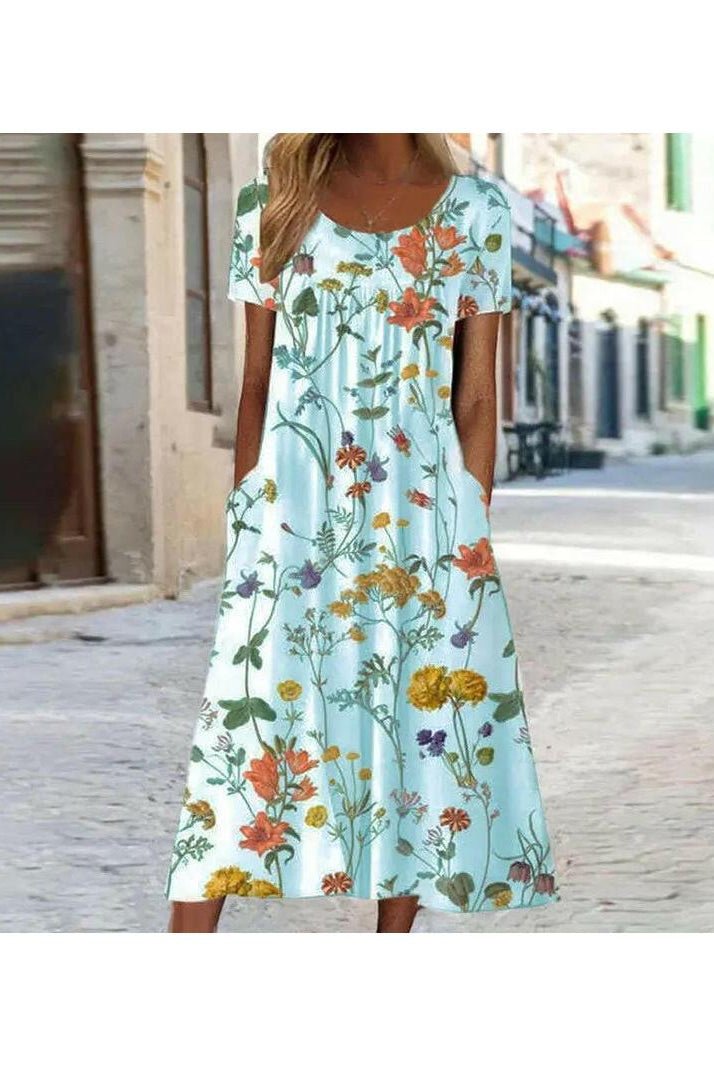 Alya Lumina Wear elegant boho floral maxi dress with tummy coverage, featuring a flowing red fabric and floral design.